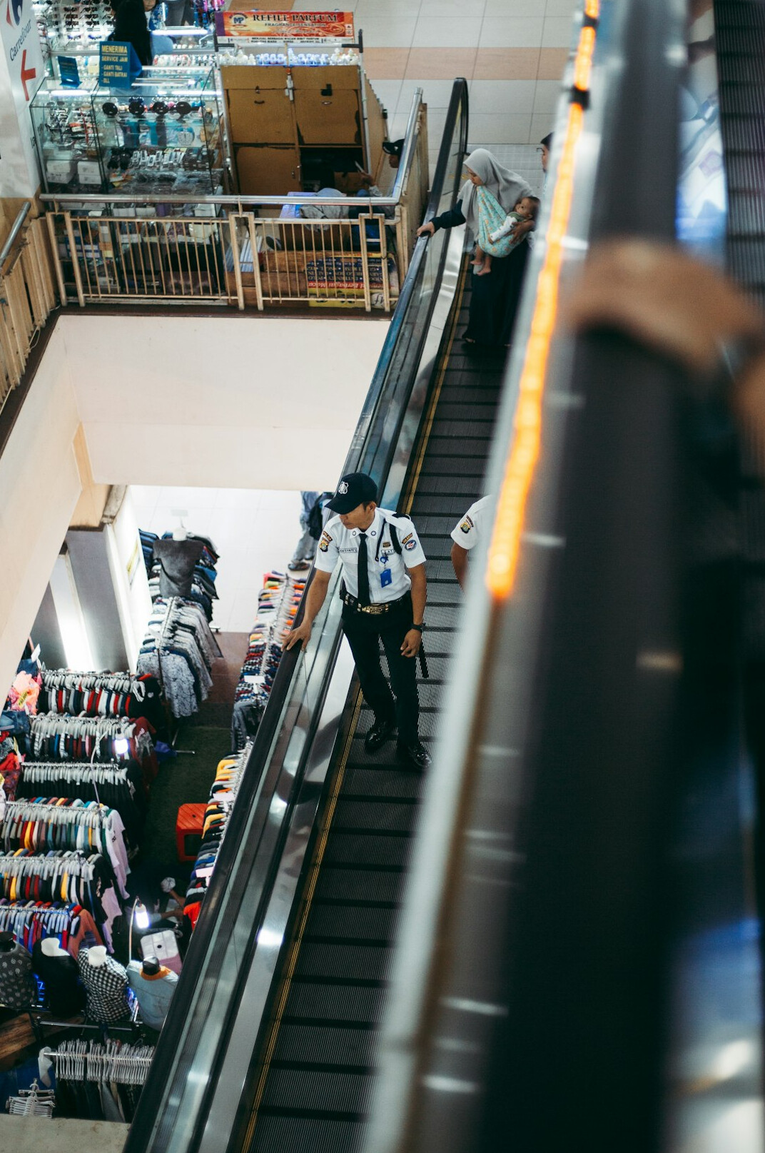 store security guard apprehending shoplifter